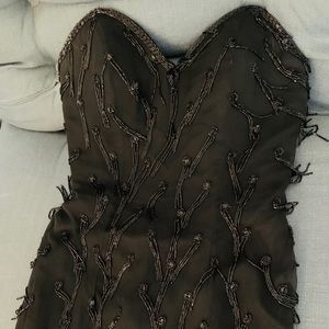 Black strapless “sweetheart” beaded tassel dress